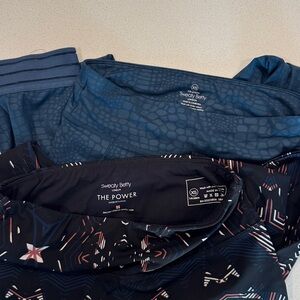 LOT OF TWO XS Sweaty Betty Leggings EUC in solid teal and design on black